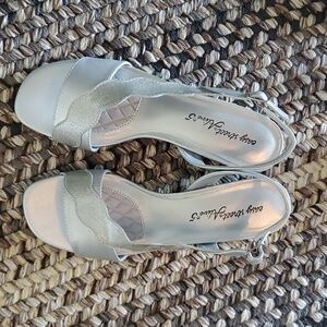 Brand new silver heels, size 8.5